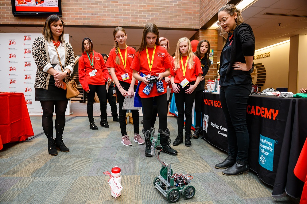 Girl controlling robot